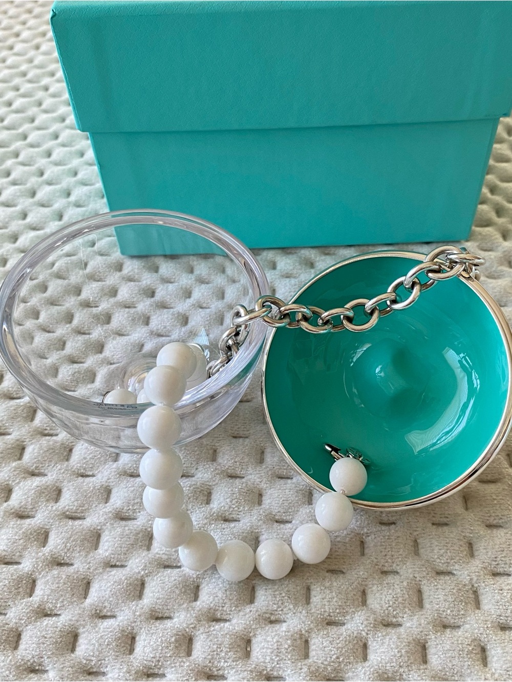 Tiffany & Co.  Crystal glass and Sterling silver with Tiffany blue enamel accent